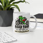 White 11 oz Road Toad Coffee mug with roadtoadcoffee.com on an office desk